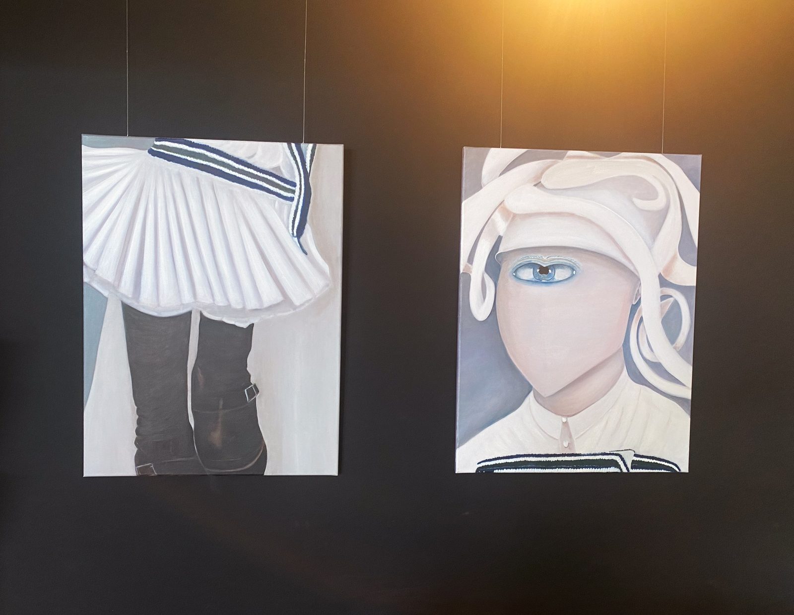 Two acrylic paintings as a diptych, one showing a detailed fashion skirt, the other a woman wearing an elaborate hat depicted with a single eye. Fashion details inspired by haute couture. The High Priestess by Botticchio, Woman Portrait Gallery.