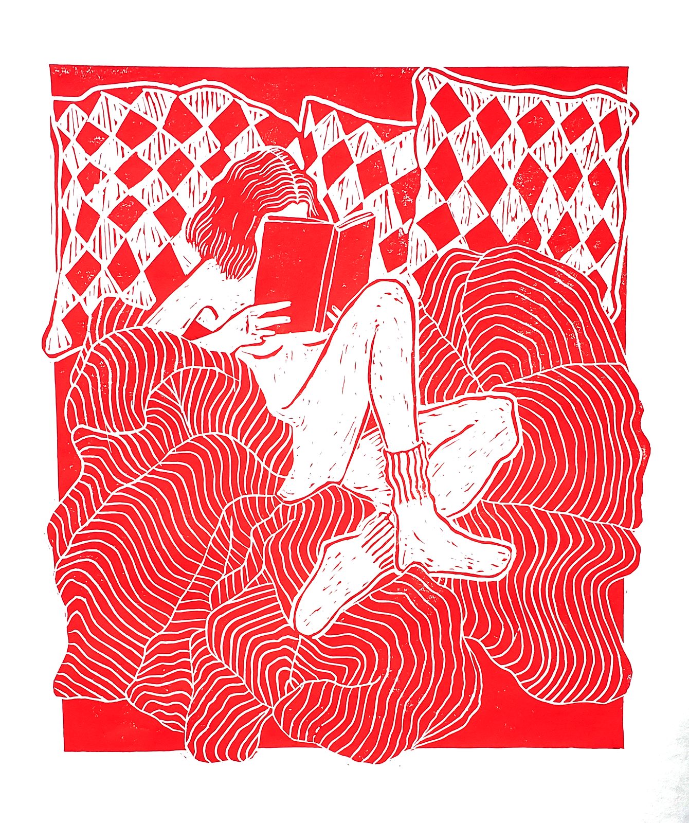 Red and white linocut print of a nude woman sitting on a large cushion, her face hidden behind the book she is reading, wearing only socks. Rich pattern work throughout. Safe Place by Macarena Cox, Woman Portrait Gallery.