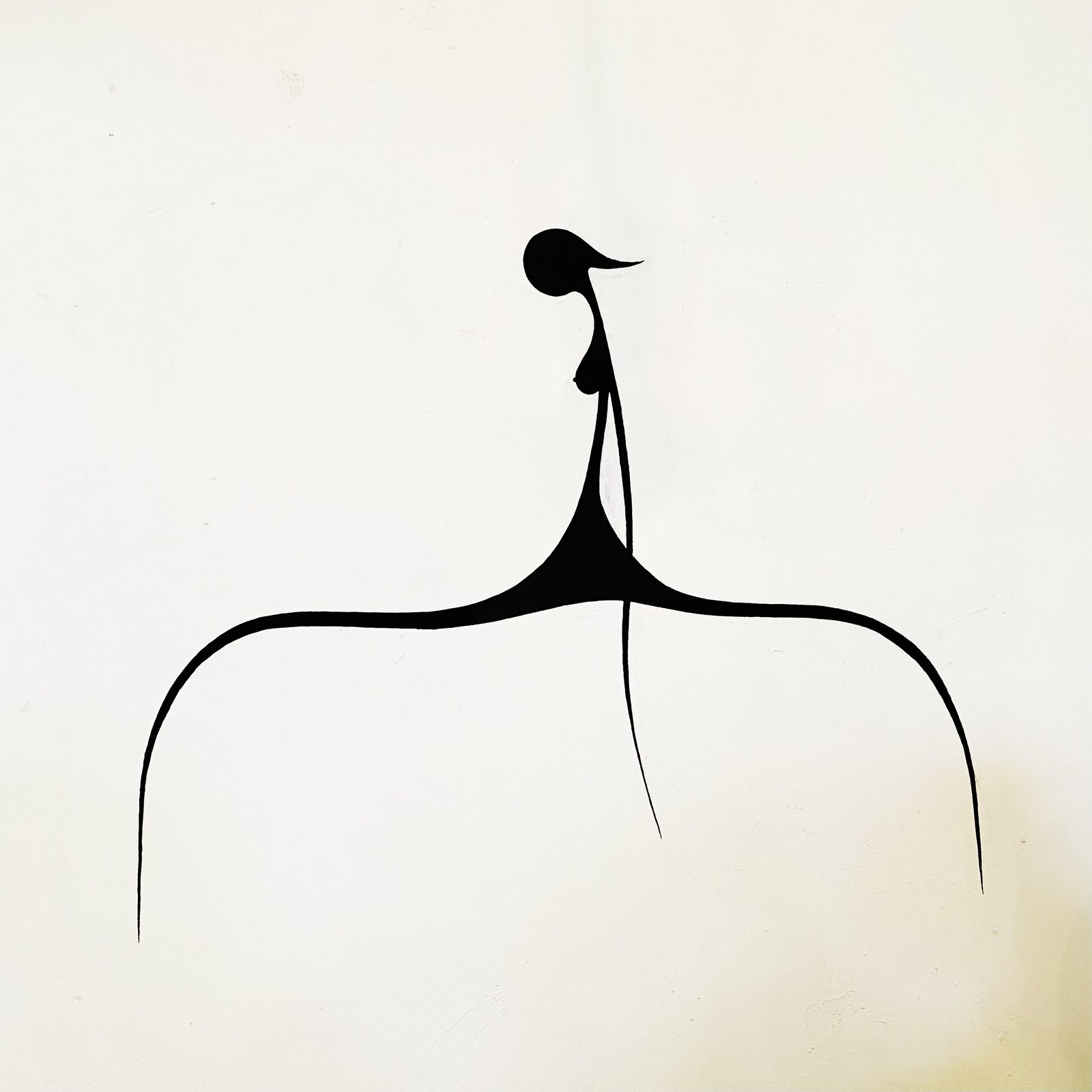 Photograph of a minimalist black acrylic wall painting on white wall, an abstracted female figure dissolving into precise clean lines. Simple.Woman by Paul Rosenbauer, Woman Portrait Gallery.